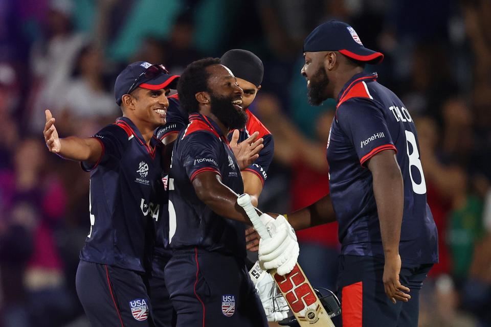 USA's Aaron Jones celebrates with his teammates after winning the 2024 ICC West Indies & USA Men's T20 Cricket World Cup match between USA and Canada at Grand Prairie Cricket Stadium on June 01, 2024 in Dallas, Texas.