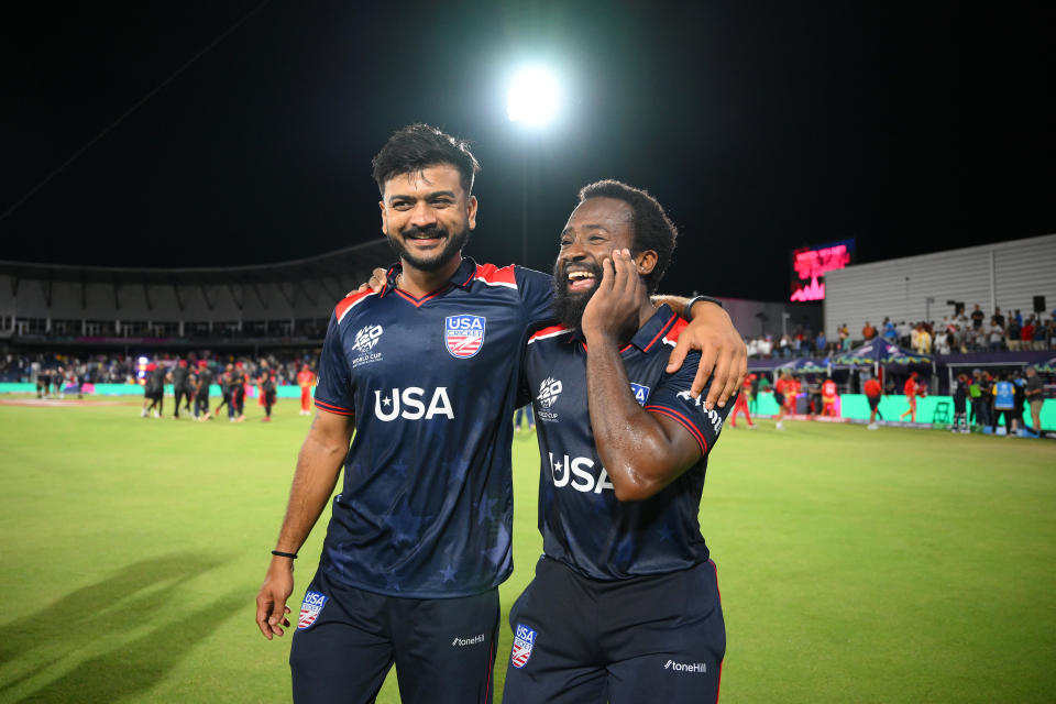 DALLAS, TEXAS – JUNE 01: Aaron Jones of USA celebrates with teammate Monank Patel after winning the 2024 ICC West Indies & USA Men's T20 Cricket World Cup match between USA and Canada at Grand Prairie Cricket Stadium on June 01, 2024 in Dallas, Texas.  (Photo by Matt Roberts-ICC/ICC via Getty Images)